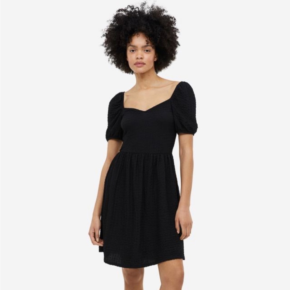 Black flowy summer dress **Tags are still on it. Never worn**